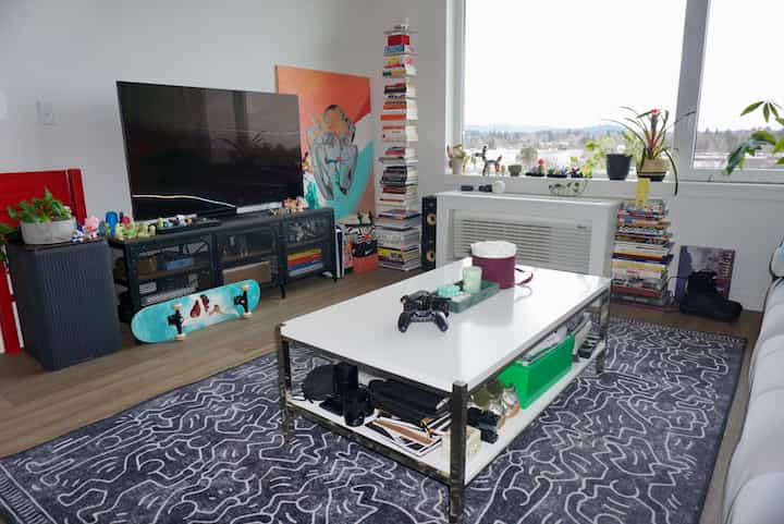My art inspired living room! I use this as a multifunctional entertaining space. #entertainmentcenter #bookcase #art #keithharing