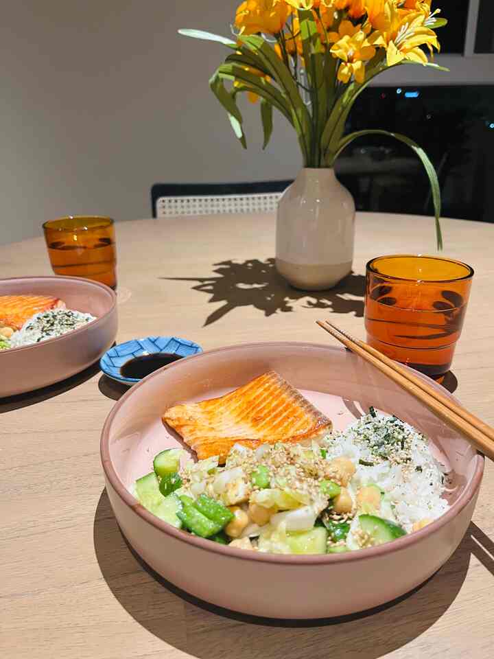 Healthy salmon bowl with miso edamame dense beal salad! All deliciously plated on Our Place’s dinnerware 😋 #dinner #diningtable #healthyfood #bowlrecommendation #ourplace #warmtones #food