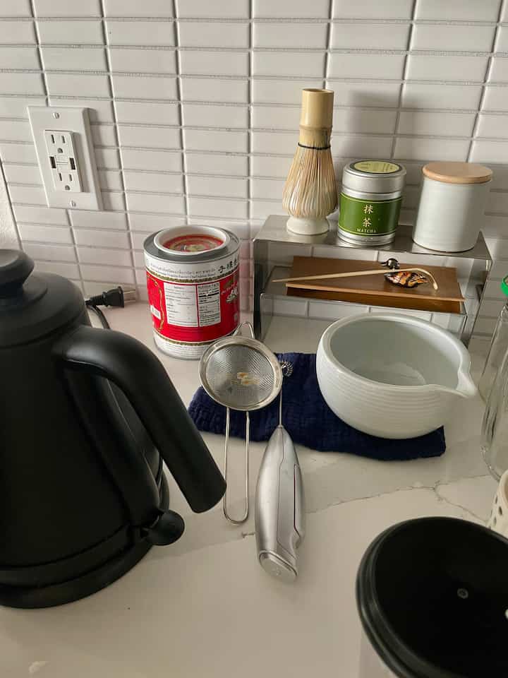 Love organizing my matcha stand by repurposing display risers! #displaystand #repurposed #kitchencounter #matcha 