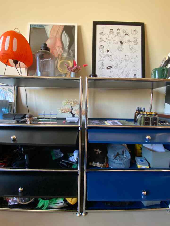 Light beige wall with metal storage units in a modern and tidy space