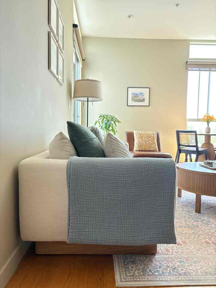 Happy Monday! Since we live in California, I love using a lighter linen throw blanket. Perfect for summer months too! #whitesofa #warmhouse #sunlight #article 