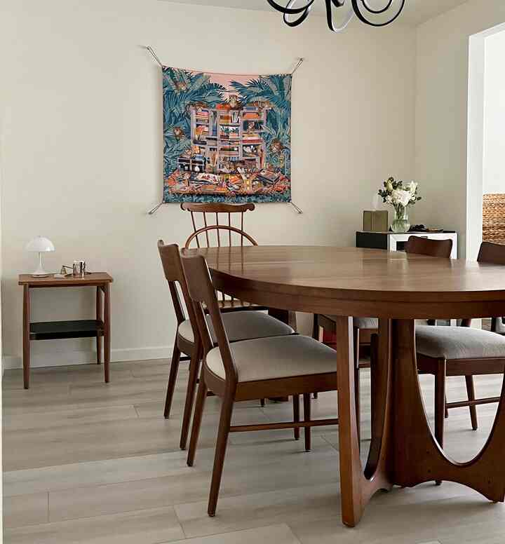 Sometimes, one dining table just isn’t enough. This warm and inviting dining area is thoughtfully filled with a walnut table and chairs, perfect for gathering with a crowd.
#diningtable #walnutinterior #diningroominterior 