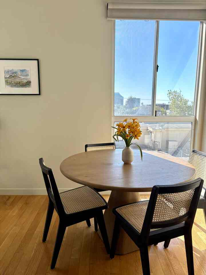 Love bringing back art from travels, this one is from Mont St. Michel 🎨 #diningtable #wovenfurniture #wicker #wallart #woodeninterior 