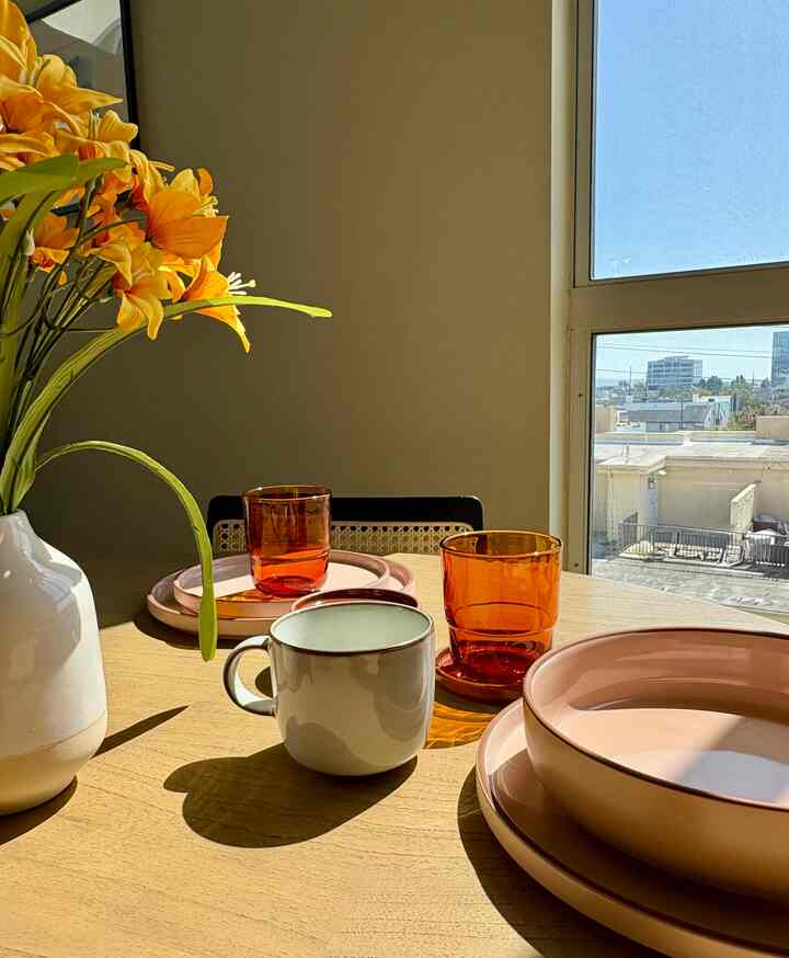 Dreamy tablescape with Our Place dinnerware 🩷 #ourplace #dinnerware #ceramic #warmtones #sunlight