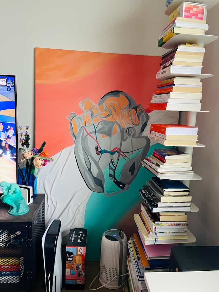 Another view with some details to my favorite corner in my living room #popsofcolor #artist #bookcase #shelf 