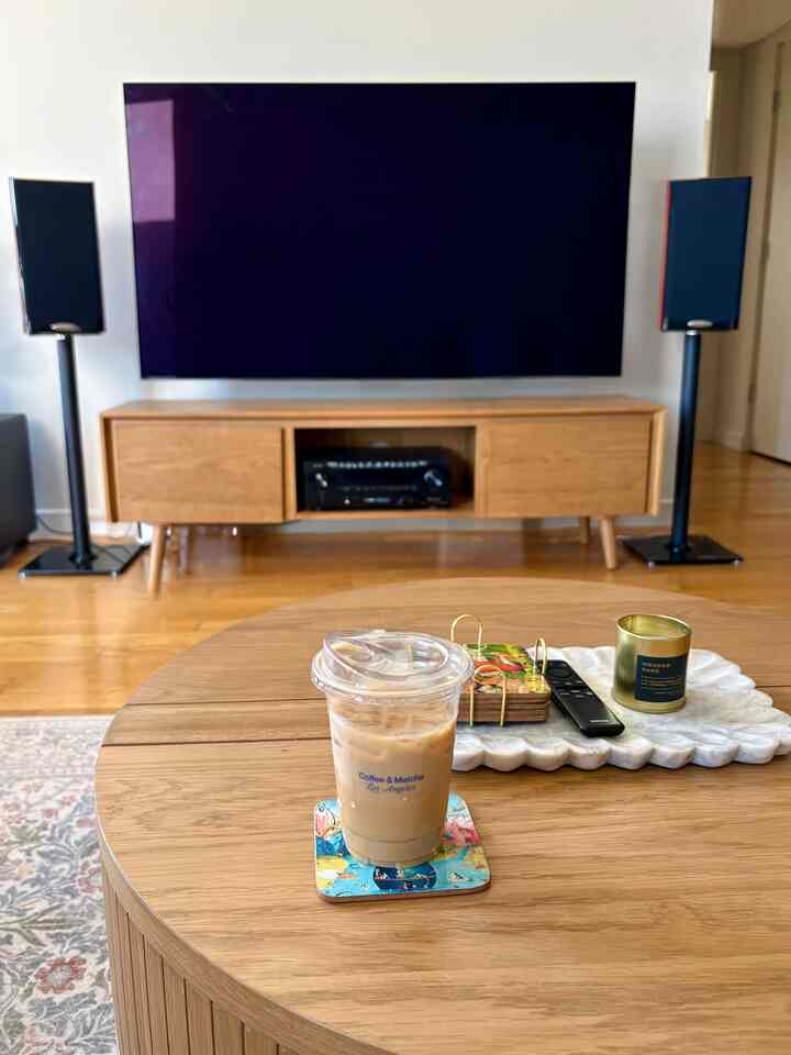 Nothing hits like a Friday afternoon ice coffee 🧊 #icecoffee #livingroom #midcenturymodern #woodeninterior #sunlight
