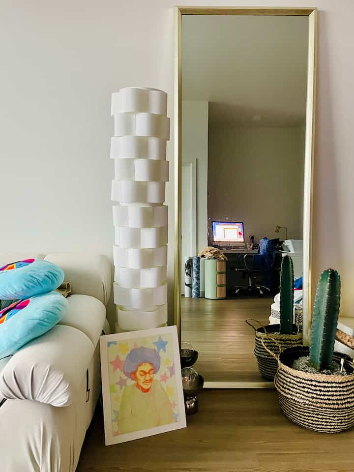 Love having a mirror in my living room. It definitely opens up my space more! #openspace #openfloorplan #livingroom #mirror