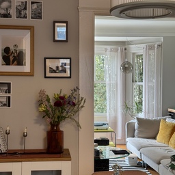 Creating our cozy space is a work in progress. It encourages us stay at home more — making the most of our rent 🥲 #livingroominterior #livingroom #cozy #mood #victorianhome #victorianwindows #eclectic #mcm #ikea #ikealighting 