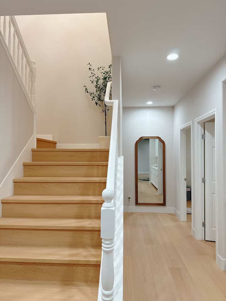 At the end of the first-floor hallway, I placed a mirror to create a sense of openness and make the space feel more inviting. 


#hallway #stairs #mirrorinterior 