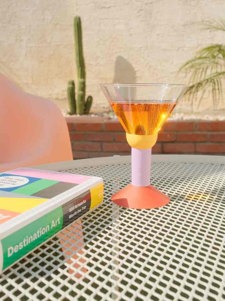 Quick vitamin D outside while the sun is still out! Enjoying some apple juice in a martini glass ;) #backyarddecor 