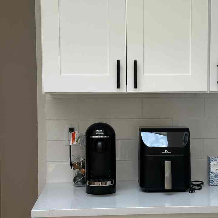 Excited to share a sneak peek of our cozy mini home cafe! We recently received this amazing air fryer from Uber Appliance as a company gift, and it has truly been a game-changer. 🖤 Plus, our Nespresso coffee machine is always ready to brew the perfect cup of coffee to complement our tasty creations. 
#kitchen #diningroom #kitchenappliances #organize  #organizingtips #kitchenitems #kitchendecoration #kitchentile #kitchendesign #cafeinterior #Homecafegram #mood #cafe  #homecafe #decoratingtips  #decoratemyroom #decoration #diningtableinterior  #midcentury #midcenturymodern

