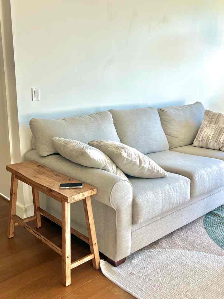 🛋️✨ A Cozy, Minimal Living Room Setup
Keeping it simple (and functional!) in my living room lately! 🌿

Instead of a coffee table, I’ve been using a skinny wooden bench in front of my grey sofa — it’s the perfect spot to keep all the essentials like remote controls, books, or a cup of coffee. ☕📚 The natural wood and soft grey combination makes the space feel warm, calm, and effortlessly cozy.

I love that this setup doesn’t clutter the room — just a few well-chosen pieces that make it easy to relax and unwind. ✨

#greysofa #woodenbench #minimaldecor #neutralhome #livingroomvibes #cozycorners #simpleliving #functionalstyle #smallspacedecor #apartmentliving #warmtones #softluxury #homeinspo #neutralpalette #calminteriors #scandistyle #cozysetup

