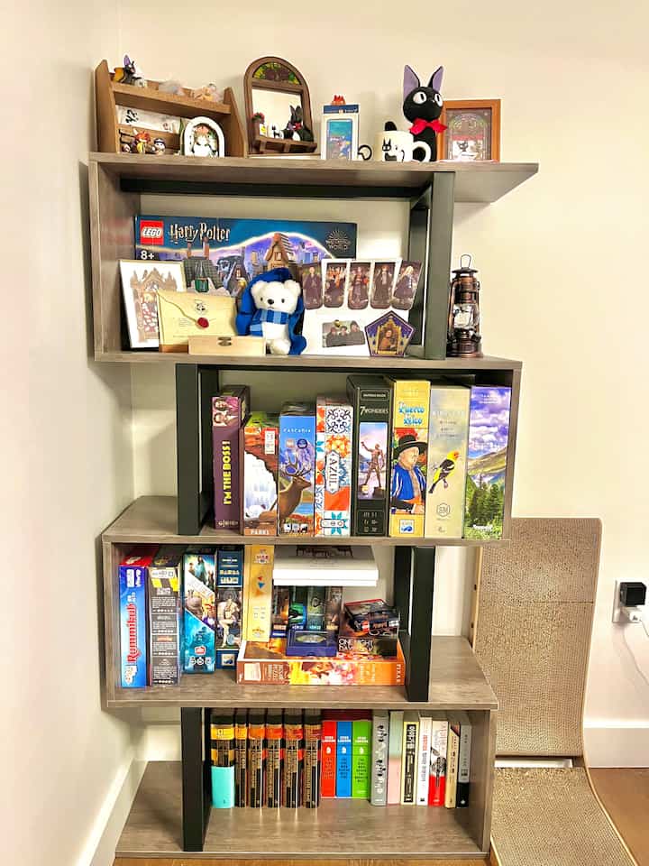 🎲✨ Board Game Corner Goals
One of my favorite little corners at home: this S-shaped wooden bookshelf that holds all our board games! 🎲🧩

I love how the unique S-curve design makes the shelf feel like a statement piece, while still being super functional. It keeps everything organized and easy to grab for a cozy game night with friends or a spontaneous round of cards. 🃏🌙

The warm wood tone adds a soft touch to the space, blending in perfectly with the rest of our home’s neutral palette. It’s proof that even practical storage can look good!

#boardgamecorner #apartmentdecor #woodenshelf #storageideas #boardgameshelf #smallspacedecor #cozyvibes #neutralhome #interiorinspo #livingroomstyling #functionaldecor #shelflove #apartmentliving #simpleliving #hyggehome #warmdecor #apartmentstyle

