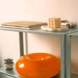 A warm corner with little treasures — the cutest Yoda, a tiny Porsche, and a pop of orange ✨ 
 #ikea
#livingroomdecor #homedecor #interiordesign #cozycorner #minimaldecor #popofcolor #designinspo #interiorinspo #modernhome #cozyvibes