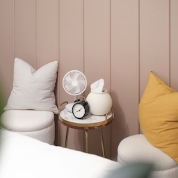 Late-night vibes with my cordless fan that runs for hours — plus a pan mode that sweeps away the heat left from the day.  
By the bed, two ottomans with plush cushions make the perfect spot for a cool and cozy evening.  
#summerdecor #homecafe #summerhomedecor #summervibes #bedroom #bedroominterior #moderninterior #cozybedroom #sidetable #accentwall #walldecoration #wallinterior #wainscotinginterior #wainscoting #boardandbattenwall #bedframe #bedroomlighting #bedroomfurniture #Beddingrecommendations #bed
