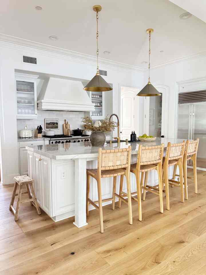 Here’s another angle of our kitchen. Add a vintage stool for instant charm! #kitcheninterior #kitchenremodeling #kitchendecor