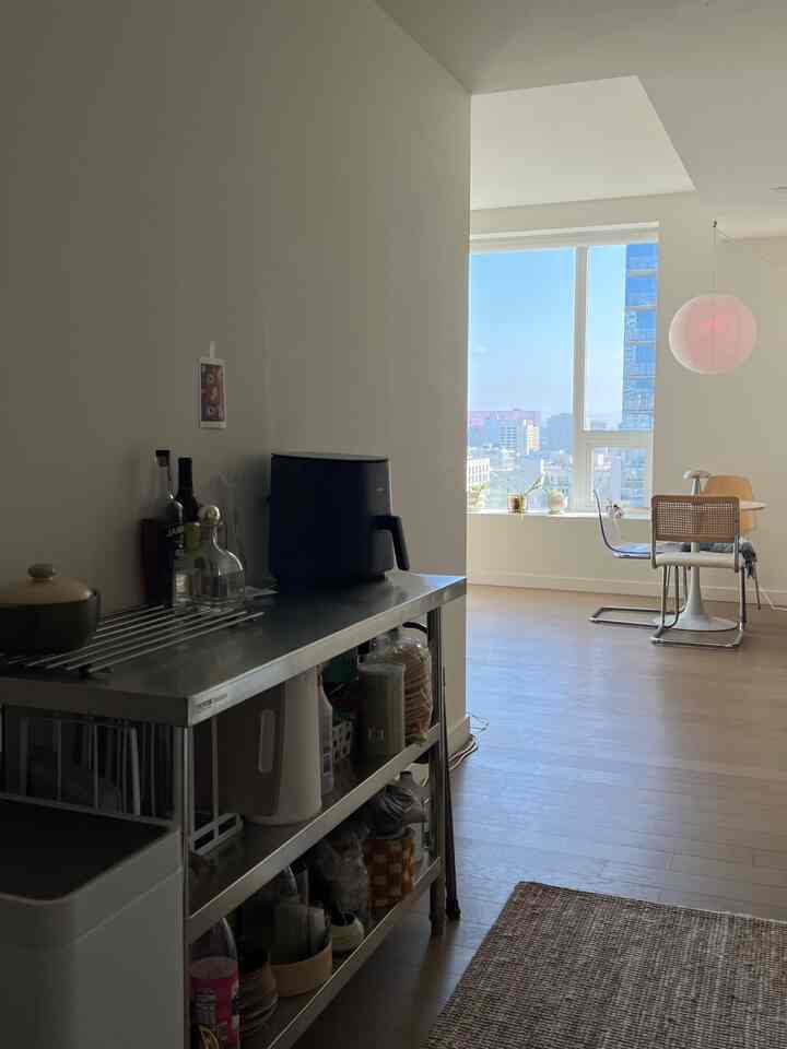 Tiny kitchen struggles solved: stainless steel prep table = more space + more style🩶 #smallspace #apartmentkitchen #chrome #smallkitchen 