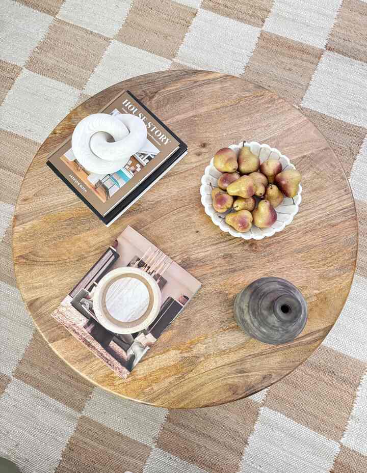 Add some faux fruit and decor books to your cofee table for some easy styling! #coffeetablestyling #decor #homedecor