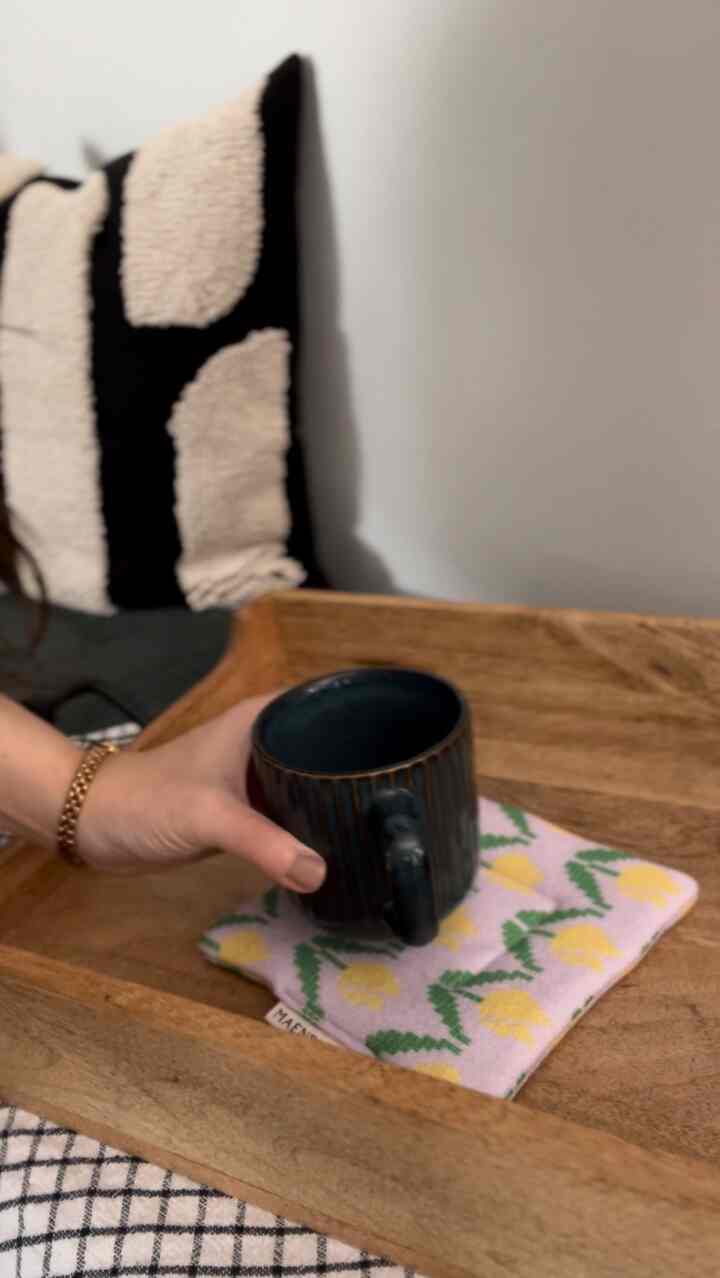 Cozy little details make any home feel warm.
Soft, fluffy, and washable, this handmade fabric coaster from Ohouse is perfect for warm coffee or cold drinks.

#entrywaydecor #entrancedecor #entrywaydesign #coaster #mugcup #bench 