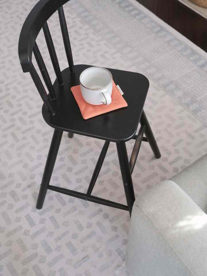 A black stool, a handmade coaster, and a book by the sofa — my perfect reading nook. ☕📖 

#MySpaceMyStyle #HomeWithPersonality #howyouhome #houseinspo #roominspo #livingroom #stool #black #nordic #ruggable #coaster #ikea