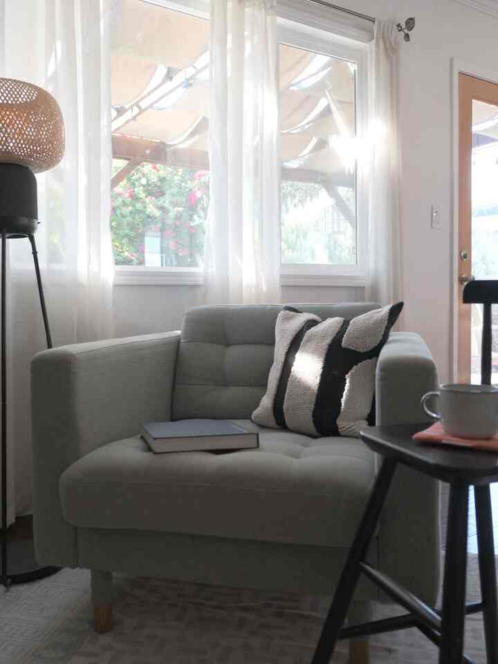 A black stool, a handmade coaster, and a book by the sofa — my perfect reading nook. ☕📖 

#MySpaceMyStyle #HomeWithPersonality #howyouhome #houseinspo #roominspo #livingroom #ikea #reading #speaker #floorlamp