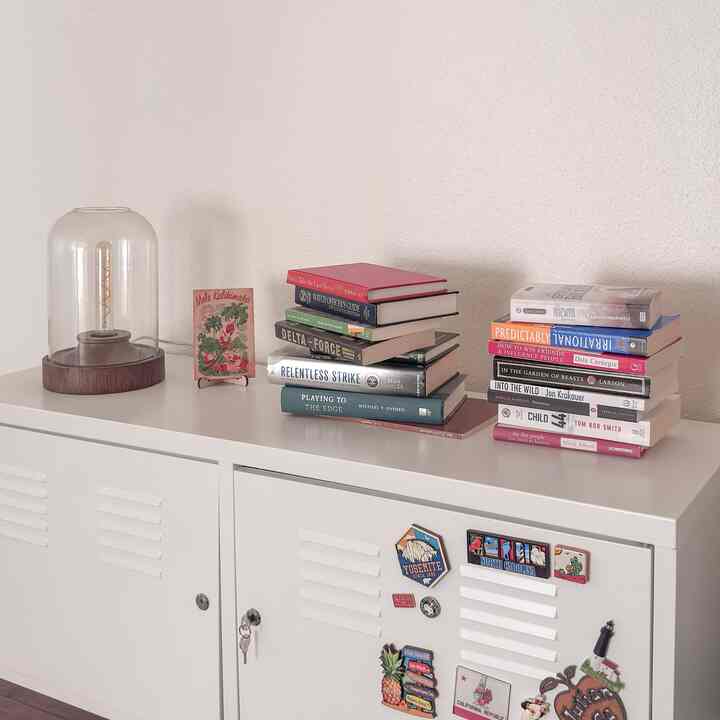 Little sneak peak of the side of the home office. #homeoffice #books #ikea #pscabinet #organizer #tablelamp 