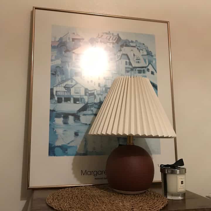 Before: an empty corner 🌙
After: framed art + pleated lamp + candle — a cozy nook on a budget ✨
It’s amazing how layering a few affordable pieces can transform the mood.

#budgetfriendly #beforeandafter #homedecoronabudget #affordabledesign

