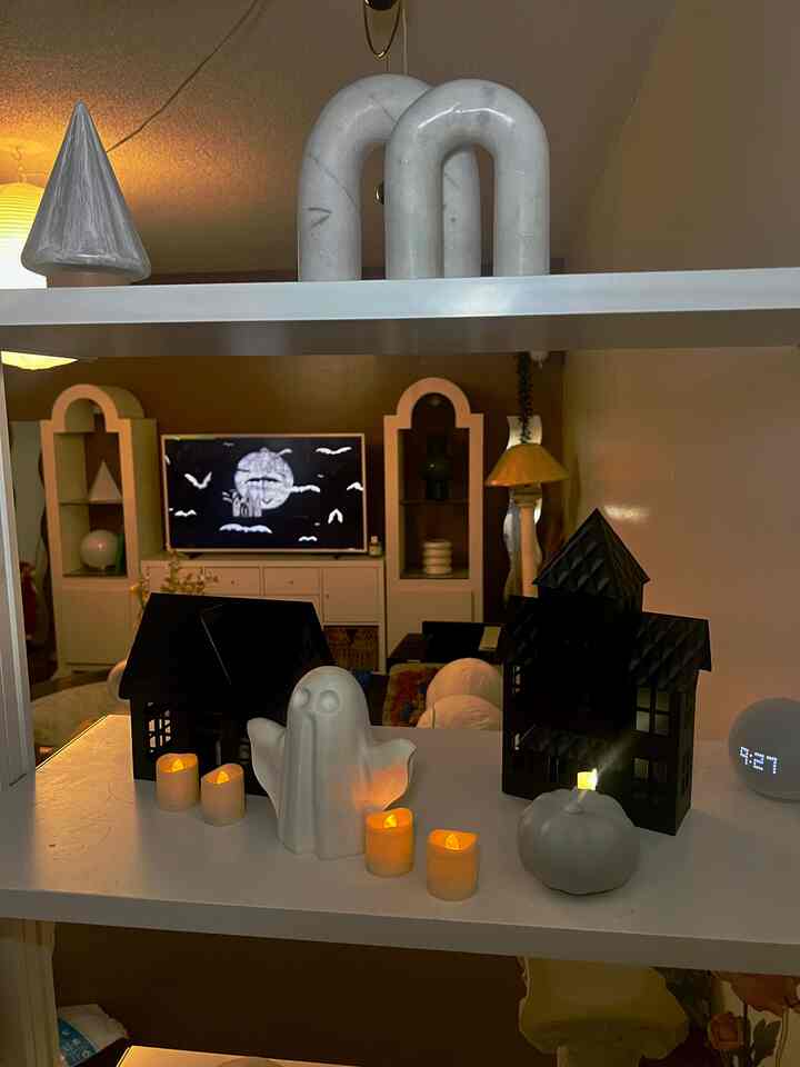 Spooky but make it cozy 👻🕯️
A few candles, a ghost, and moody black houses just enough to bring that Halloween vibe home 🎃✨

#halloweendecor #halloweenvibes #spookyseason #fallfun #homefortheholidays