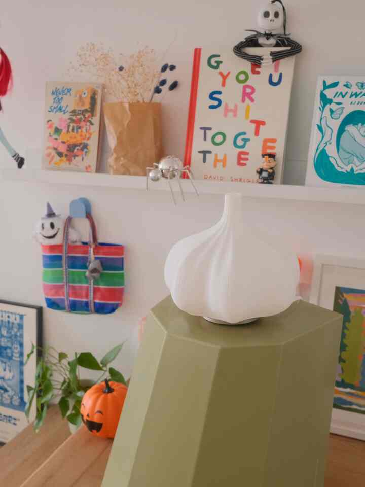 Cozy bookshelf with halloween decorations #halloweendecor #halloweenvibes