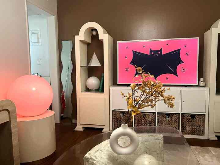 Spooky night in 🦇✨
Soft red glow, fall florals, and a little Halloween fun on screen 
keeping it festive but minimal 👻

#halloweendecor #halloweenvibes #spookyseason #fallfun #homefortheholidays