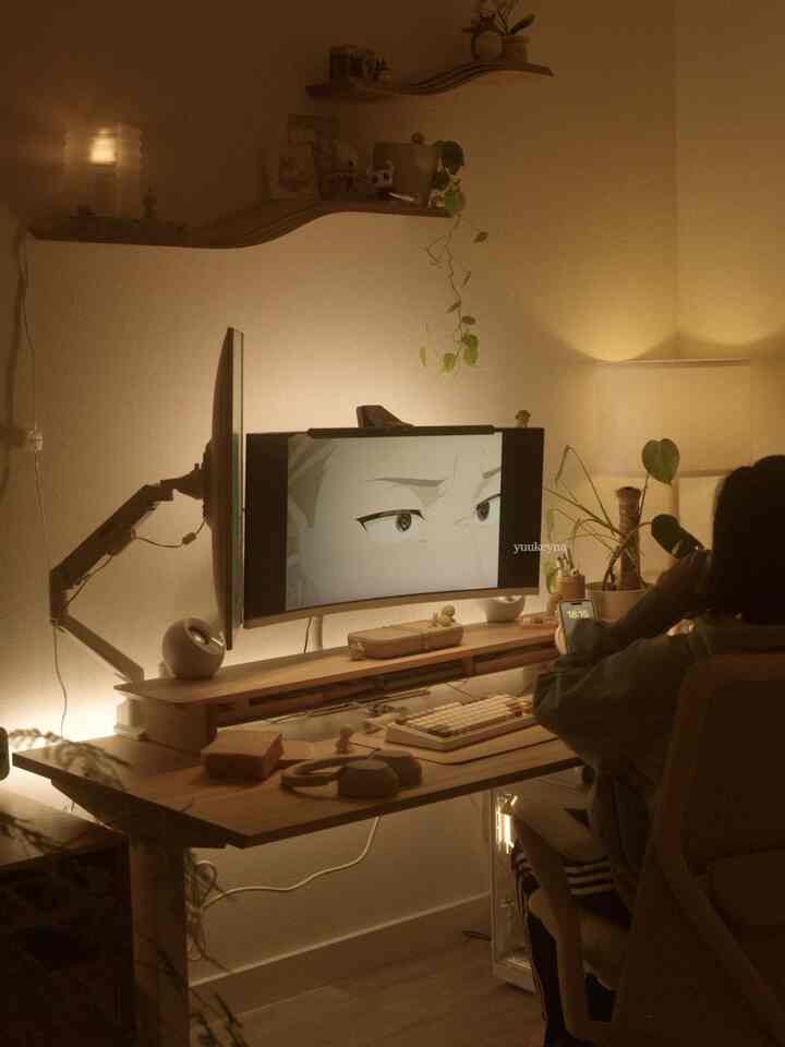 Cozy home office space with warm wood tones and soft lighting, featuring a desk and shelves in mid-century and Japandi style