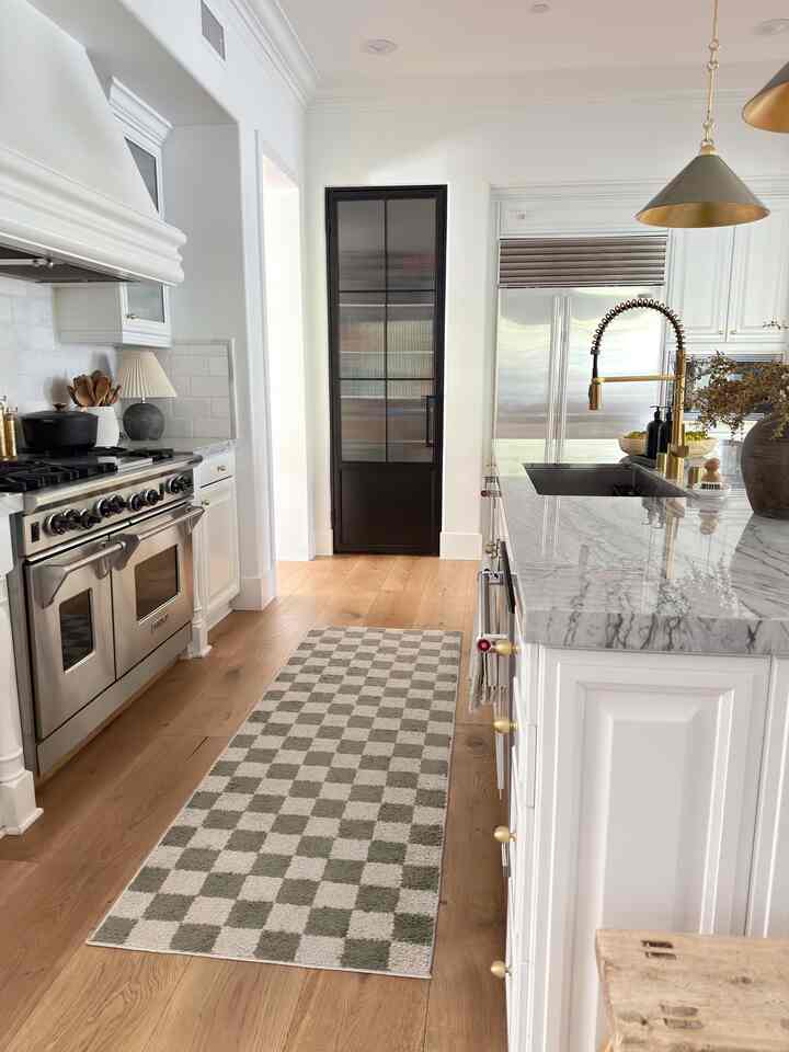 New pantry Door! I love adding mldern touches to a traditonal kitchen! #kitchendesign #pantrydoor #kitchenstyling