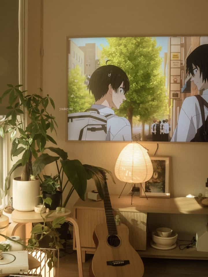 Natural-toned living room featuring plants, guitar, and warm lighting with cozy atmosphere