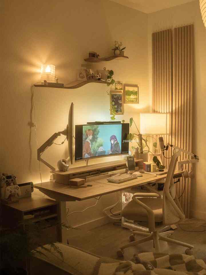 Natural wood tones and warm lighting blend in a modern home office space with a cozy atmosphere