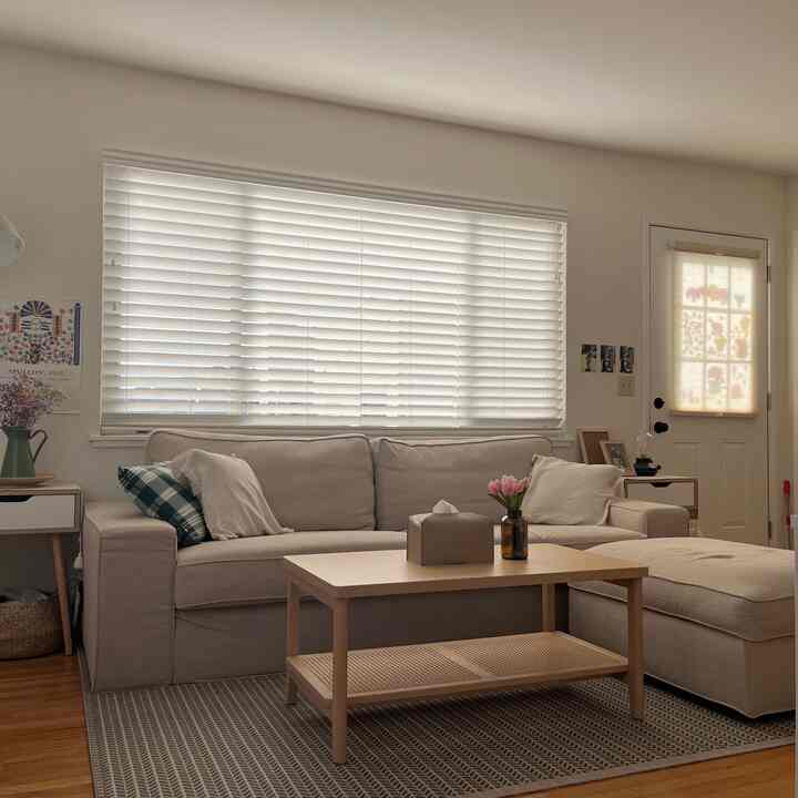 Beige and natural-toned living room featuring sofa and coffee table, creating a cozy atmosphere