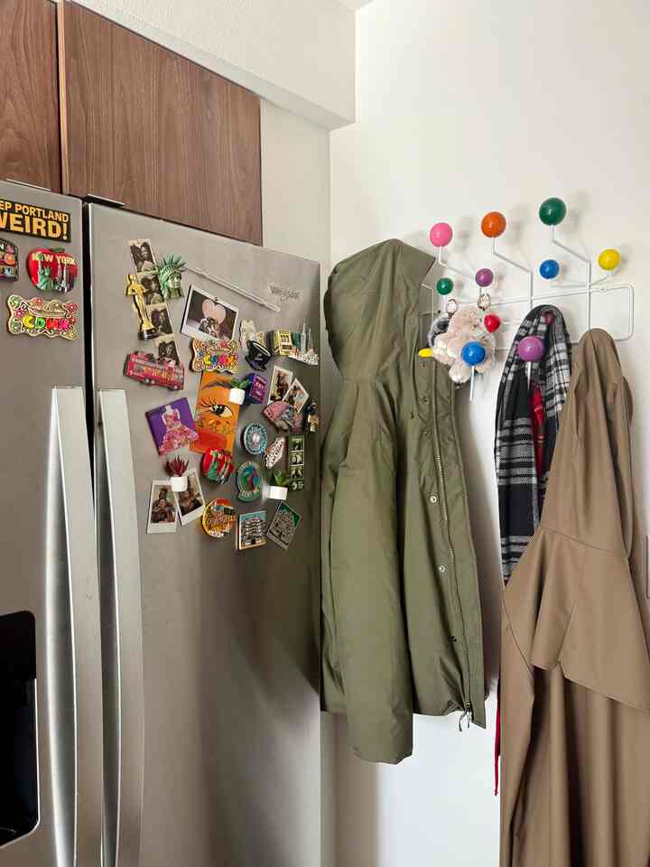 Love a functional small space entryway! Needed this part of my apartment to feel fun and functional. #popofcolor #fridgemagnets #colorfulinterior