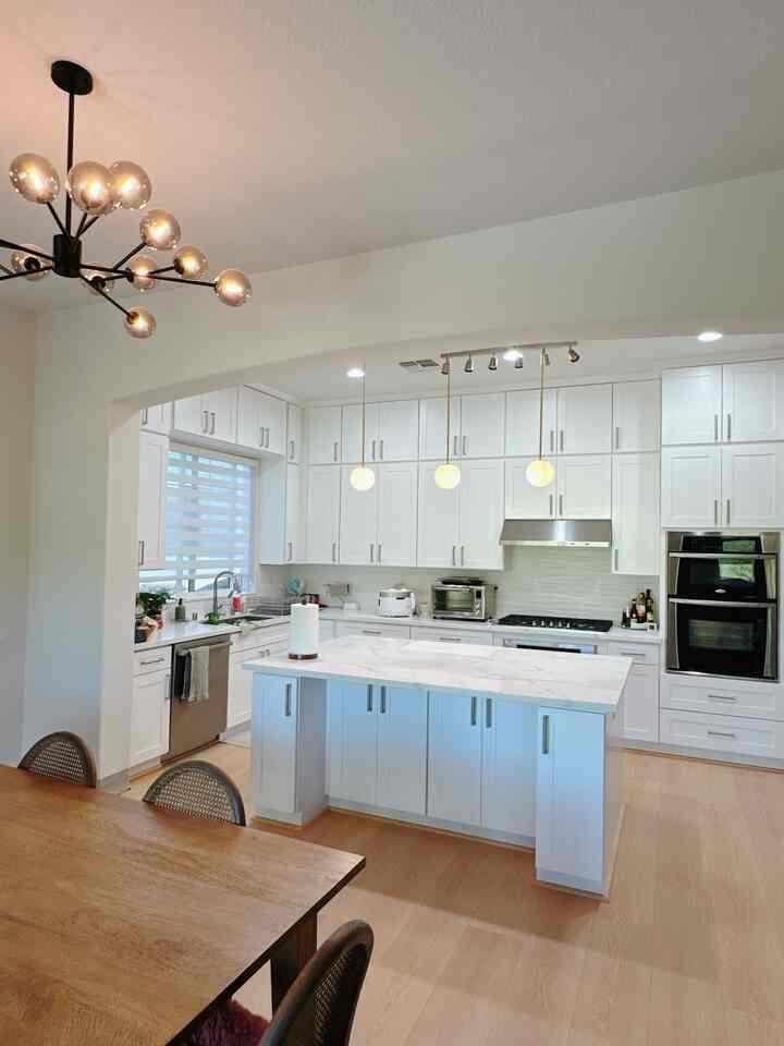 Before & After 

I finally switched out the pendant light.

The old pendant lights had way too many crystals. They looked like nightclub disco balls.😂 
Now I’ve got something much more simple and clean-looking.

#pendantlight #kitchenisland #lighting 