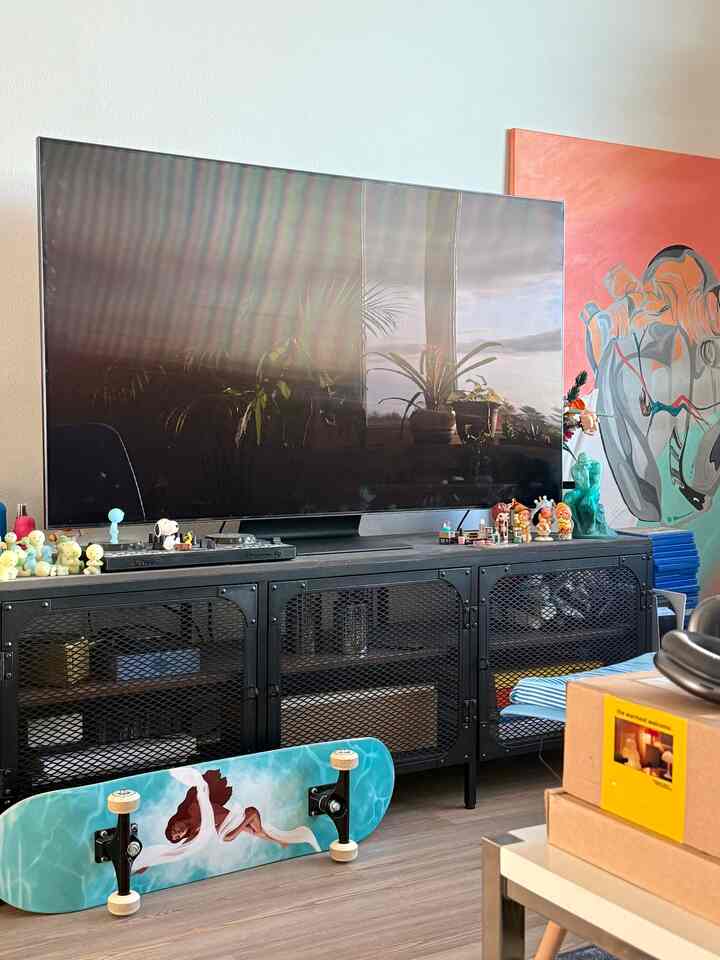 Some pops of teal and orange in my living room using art I made! #artist #designer #livingroom #entertainment